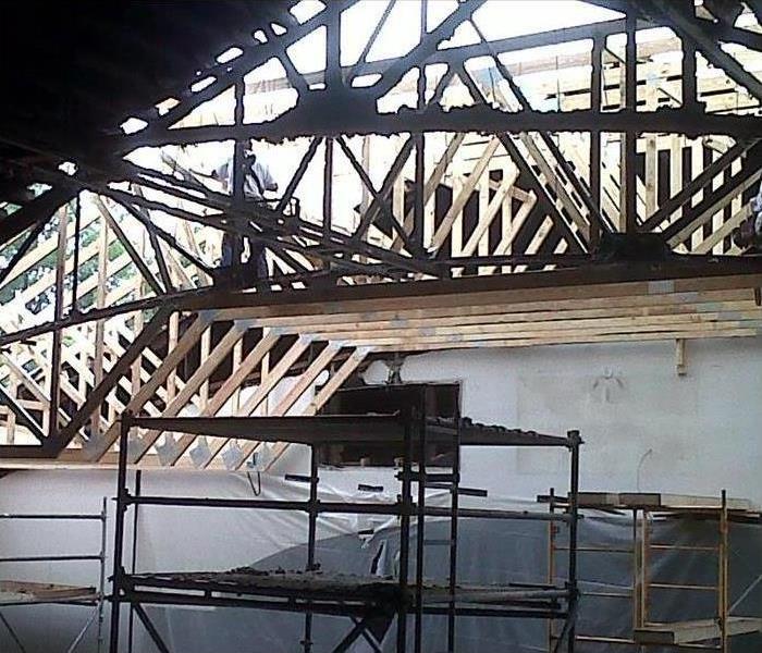 Repairing structure of a building after fire damage